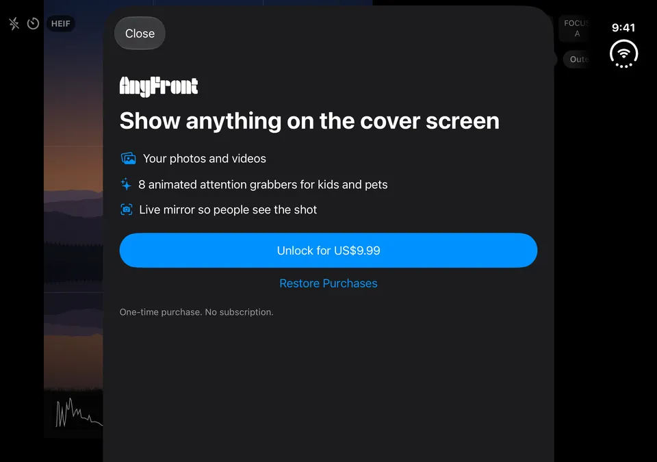 The unlock sheet on the inner screen: Show anything on the cover screen, a one-time purchase, with Restore Purchases.